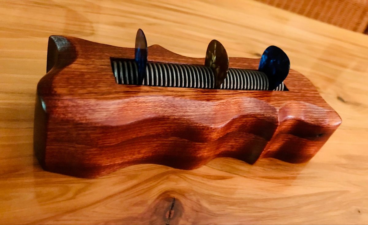 Guitar-themed woodworking piece